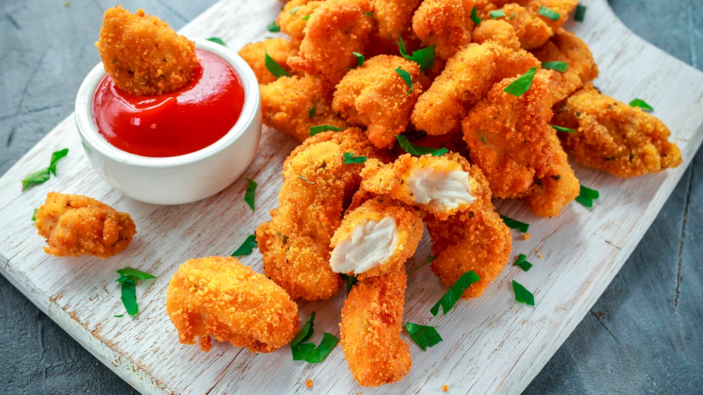 nuggets de pollo con salsa de la casa